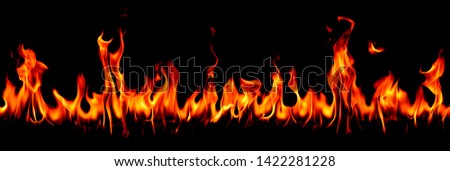 Fire flames on Abstract art black background panorama, Burning red hot sparks rise, Fiery orange glowing flying particles