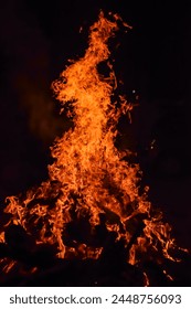 Fire flames on black background, Blaze fire flame texture background, Beautifully, the fire is burning, Fire flames with wood and cow dung bonfire