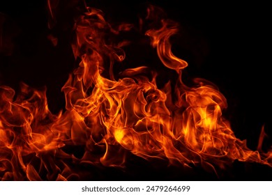 Fire flames on black background. Fire burn flame isolated, abstract texture. Flaming effect with burning fire.