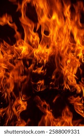 Fire flames on black background. Abstract blaze fire flame texture for banner background. Fire flames on black background. Fire flame texture