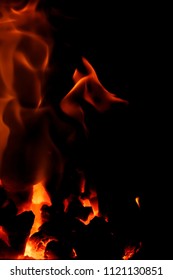 Fire flames with reflection on black background