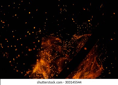 Fire Flames With Sparks On A Black Background