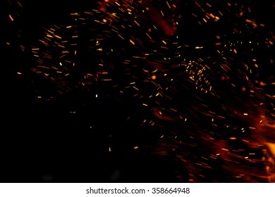 Fire Flames With Sparks On A Black Background