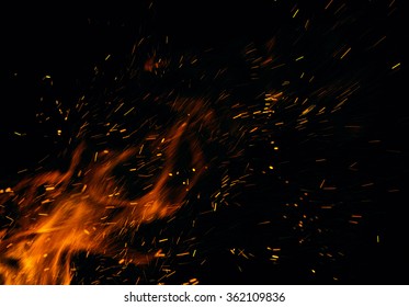 Fire Flames With Sparks On A Black Background