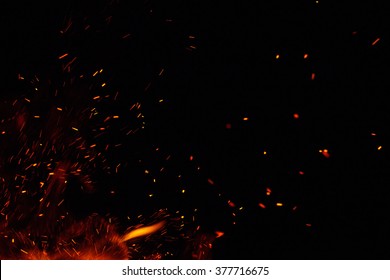 Fire Flames With Sparks On A Black Background