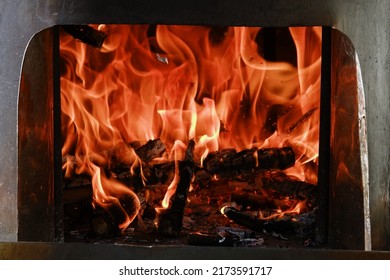 Fire Flames From A Wood Stove Fire Isolated On A Black Background