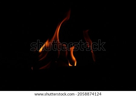 A fire flaming in the darkness
