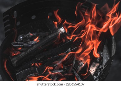 Fire From The Grill Burning With Wood And Coal Caught In A Beautiful Moment