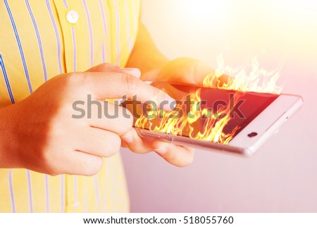 fire hand hold fire smartphone.