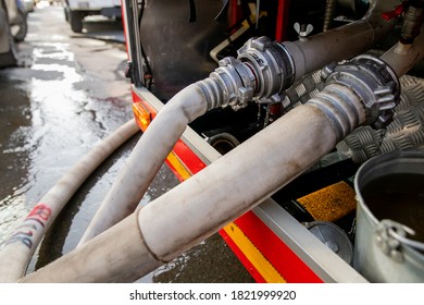 Fire Hoses At A Fire Engine, High Water Pressure