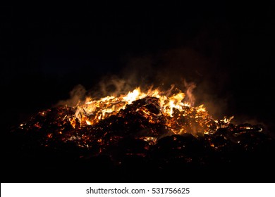 The fire and hot coals on a dark background - Powered by Shutterstock