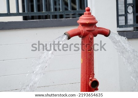 Fire hydrant being flushed by for maintenance. Fire hydrant leaking.