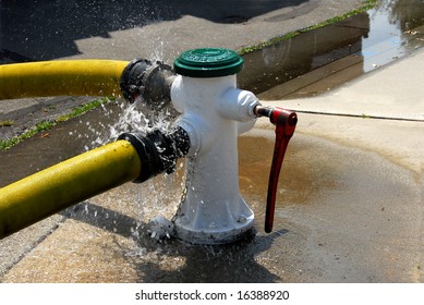 Fire Hydrant Being Used At A Working Fire