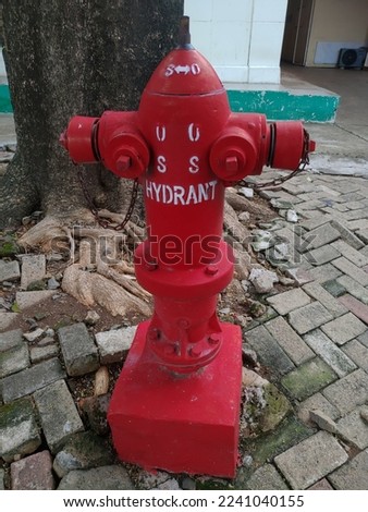 a fire hydrant located at the office location of the MNC building, a television company in Indonesia