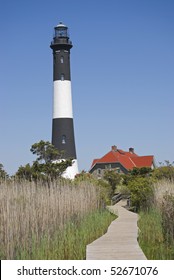 The Fire Island Lighthouse as seen from the nature boardwalk in Fire Island National Seashore State Park in Long Island.