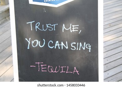 Fire Island, New York, USA - July 14, 2019: Trust Me, You Can Sing Sign