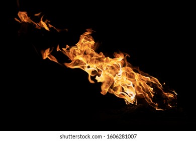 Fire isolated flame burning at dark background in high quality