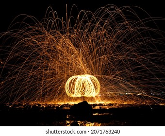 Fire Juggling On The Beach Of Phuket