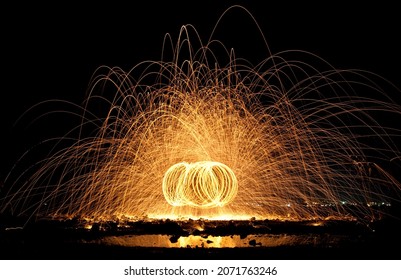 Fire Juggling On The Beach Of Phuket