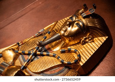 Fire lighted scene of some closeup details of an ancient Egyptian artifact. High quality photo