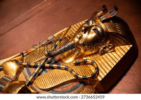 Fire lighted scene of some closeup details of an ancient Egyptian artifact. High quality photo