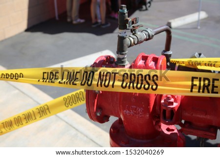 FIRE LINE - DO NOT CROSS. Fire Department Yellow Caution Tape. Warning Tape. Fire Line tape. Fire Department Warning. Work Site. Emergency Site. Do not enter. 