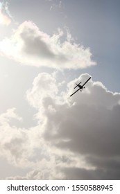 Fire On The East Coast Of Queensland, Australia With An Airplane Flying Overhead.