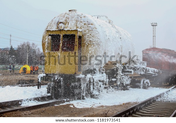fire on the railway, train derailed, had an\
accident and a broken car caught fire, high temperature fire\
extinguishes fire brigade with hoses and foam without help of\
water, danger of fuel\
explosion