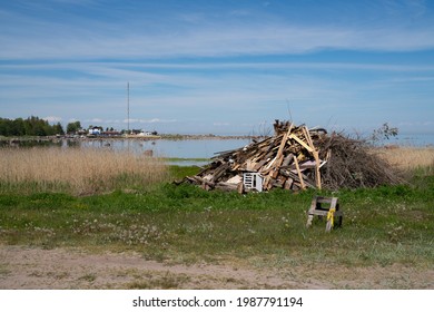 Fire Place Set Up For Mid Summer Day Festival. Fire Wood Collected To Be Lit During The Mid Summer Evening. Pile Of Wooden Trash Waiting To Be Burned. Fire Place By The Prangli Island Beach.