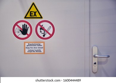 Fire Protective Door With Signs And Text In Three Languages (german, English, French) In An EX Explosive Hazard Area With