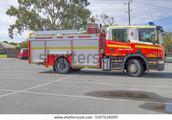 Fire and rescue\
truck stopped in car park