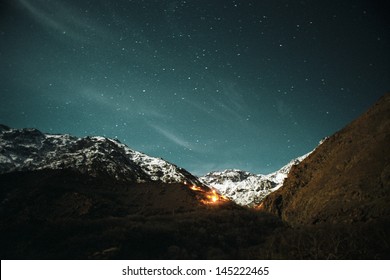 Fire In Rugged Mountainous Landscape