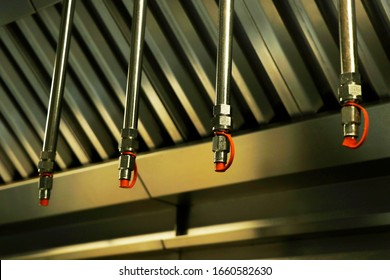 fire and safety equipment, emergency water dispenser sprinkler under the roof hood usually fixed in kitchen, factories and warehouses to prevent the fire accident - Shutterstock ID 1660582630