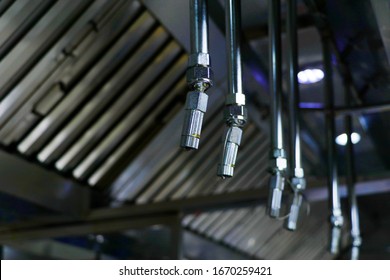 fire and safety equipment, emergency water dispenser sprinkler under the roof hood usually fixed in kitchen, factories and warehouses to prevent the fire accident - Shutterstock ID 1670259421