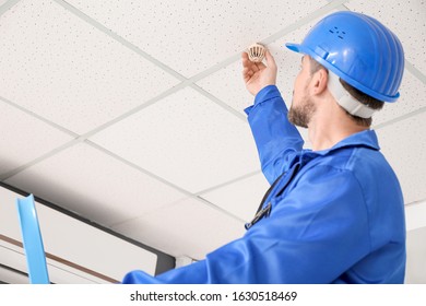 Fire Safety Specialist Inspecting Building