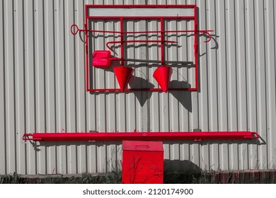 Fire Shield, On An Iron Wall, With Fire Fighting Tools