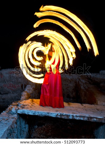 Fire show with fire-juggling