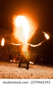 fire show at night with different patterns from the fire