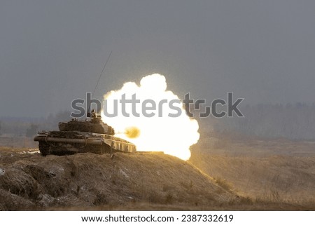 Fire and smoke from a tank shot during training at the training ground