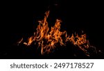 Fire sparks background. Abstract dark fire flames background. Background of flames blazing. Blaze flames background with copy space. Burning fire concept.