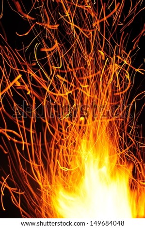 Fire spitting trailing sparks