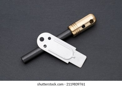 Fire Starter, Camping Equipment On Dark Grey Background 