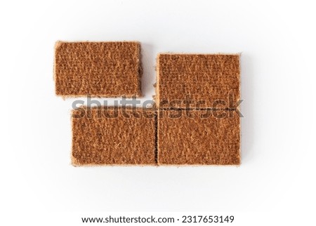 Fire Starters Four Blocks with One Separated Composition - Recycled Cardboard Rectangle Piesces Isolated on White Background - Natural Light Close up