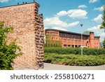 Fire station buildings near the old town ramparts in Poznań, Poland, showcasing historic red-brick architecture