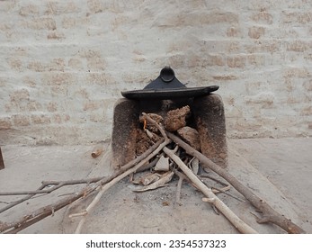 Fire in stove. Beautiful scene of village in evening. - Shutterstock ID 2354537323