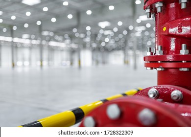 fire suppression system in big logistic center - Shutterstock ID 1728322309