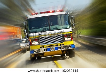 Fire Truck in Action - California, USA. Fire Department at Work. Flashing Lights of Fire Truck. Transportation Collection.