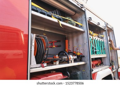 Fire Truck Close Up. Equipment Packed Inside Fire Engine.