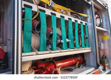 Fire Truck Close Up. Equipment Packed Inside Fire Engine.