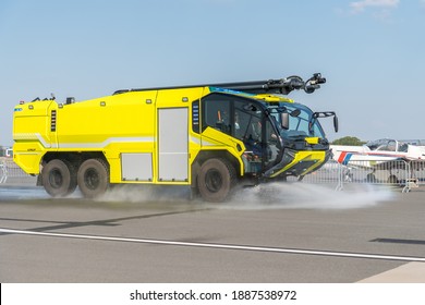 Fire Truck On The Airport Runway With Equipment For Firefighting Operations